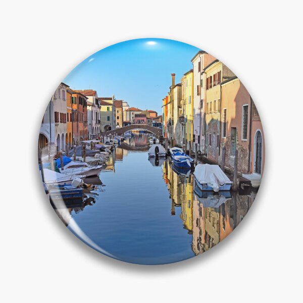 Item preview, Chioggia cityscape with narrow water canal Vena with moored multicolored boats between old colorful buildings,Veneto Region, Italy designed and sold by goceris.
