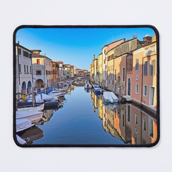 Item preview, Chioggia cityscape with narrow water canal Vena with moored multicolored boats between old colorful buildings,Veneto Region, Italy designed and sold by goceris.