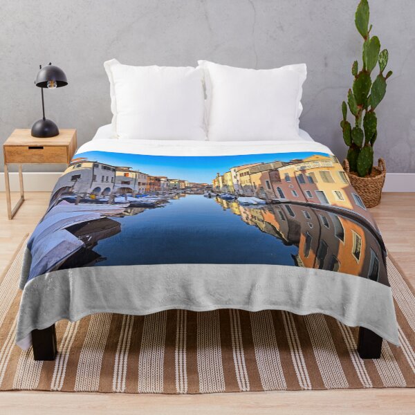 Item preview, Chioggia cityscape with narrow water canal Vena with moored multicolored boats between old colorful buildings,Veneto Region, Italy designed and sold by goceris.