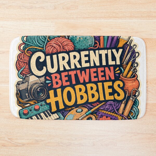 Item preview, Currently Between Hobbies Colourful Crafting Design designed and sold by Peak Pop Designs | Funny Gifts, Cozy Art & Cute Animals .
