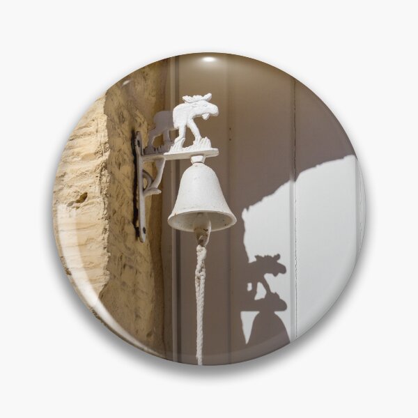 Item preview, White Decorative Door Bell With Moose Motif Mounted on Rustic Stone Entrance Casting Shadow designed and sold by Nmallia.