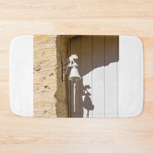 Item preview, White Decorative Door Bell With Moose Motif Mounted on Rustic Stone Entrance Casting Shadow designed and sold by Nmallia.