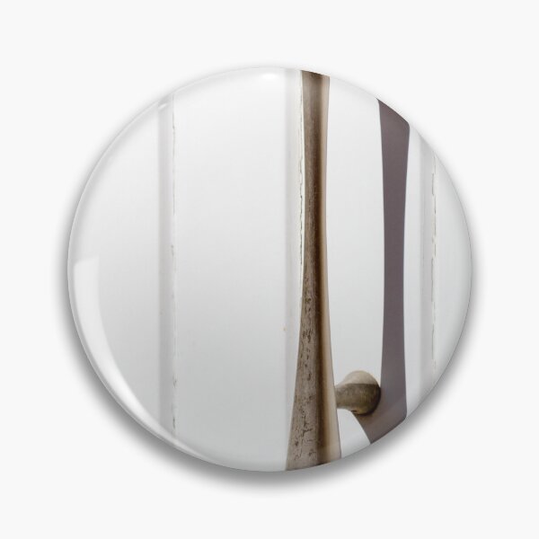Item preview, Brass Door Handle on White Paneled Door Casting a Sharp Shadow Minimalist Hardware designed and sold by Nmallia.