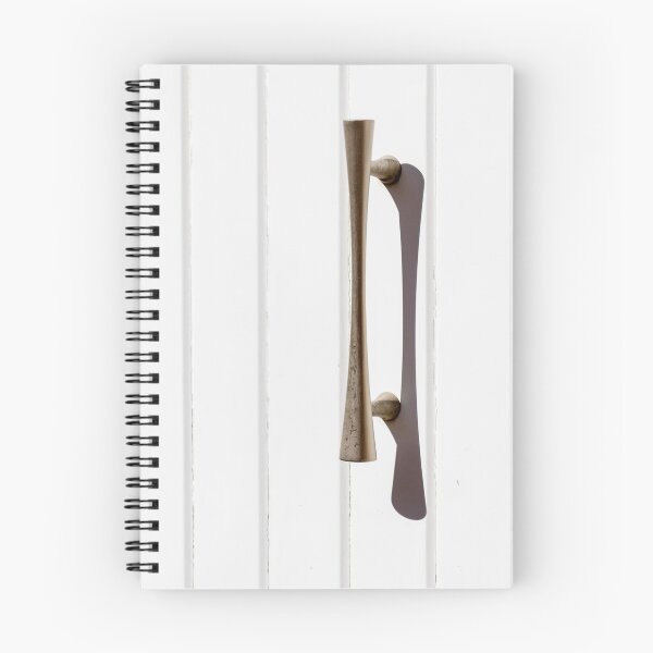 Item preview, Brass Door Handle on White Paneled Door Casting a Sharp Shadow Minimalist Hardware designed and sold by Nmallia.