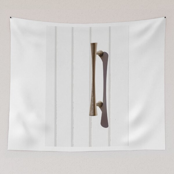 Item preview, Brass Door Handle on White Paneled Door Casting a Sharp Shadow Minimalist Hardware designed and sold by Nmallia.