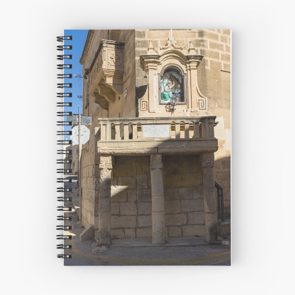 Item preview, Stone Balcony Shrine With Religious Statue And Historic Mediterranean Architecture On Sunny Street Corner designed and sold by Nmallia.