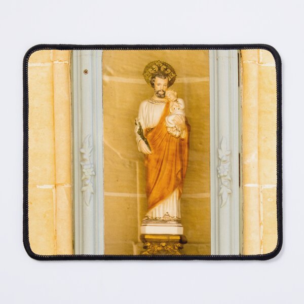 Item preview, Saint Statue Holding Child In Arched Church Niche With Decorative Frame And Warm Stone Wall designed and sold by Nmallia.
