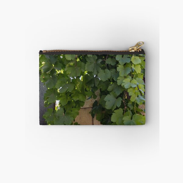 Item preview, Lush Green Grapevine Leaves Climbing Stone Wall in Sunlit Garden Vines and Foliage designed and sold by Nmallia.