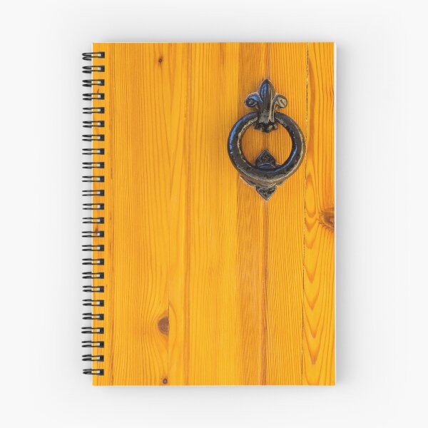 Item preview, Vintage Black Iron Door Knocker on Warm Orange Wooden Door With Rustic Texture designed and sold by Nmallia.