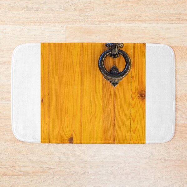 Item preview, Vintage Black Iron Door Knocker on Warm Orange Wooden Door With Rustic Texture designed and sold by Nmallia.