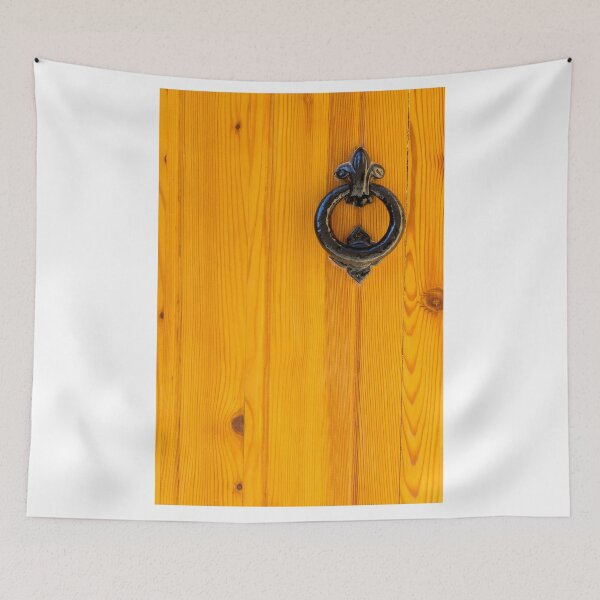 Item preview, Vintage Black Iron Door Knocker on Warm Orange Wooden Door With Rustic Texture designed and sold by Nmallia.