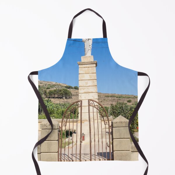 Item preview, Stone Madonna Statue on Pillar Behind Wrought Iron Gate at Rural Shrine Under Blue Sky designed and sold by Nmallia.
