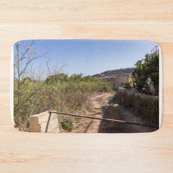 Item preview, Sunny Rural Path Through Mediterranean Countryside With Stone Wall, Yellow Wildflowers and Hilltop Village designed and sold by Nmallia.