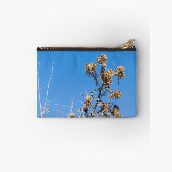 Item preview, Dry Thistle Seedheads Against Clear Blue Sky in Arid Wild Grass Field designed and sold by Nmallia.