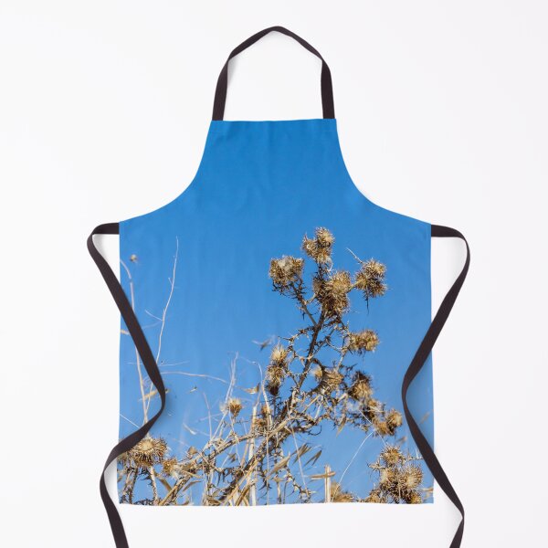 Item preview, Dry Thistle Seedheads Against Clear Blue Sky in Arid Wild Grass Field designed and sold by Nmallia.