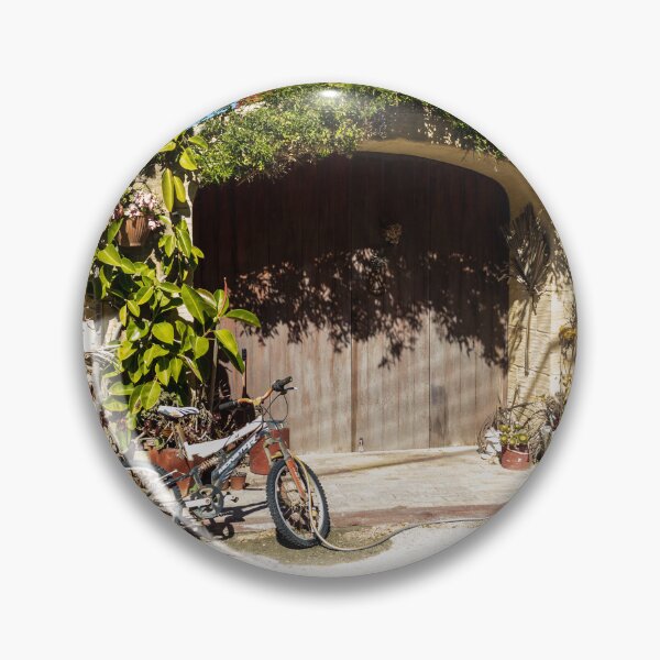 Item preview, Old Bicycle Leaning Against Stone Wall Near Wooden Gate with Potted Plants in Sunny Courtyard designed and sold by Nmallia.