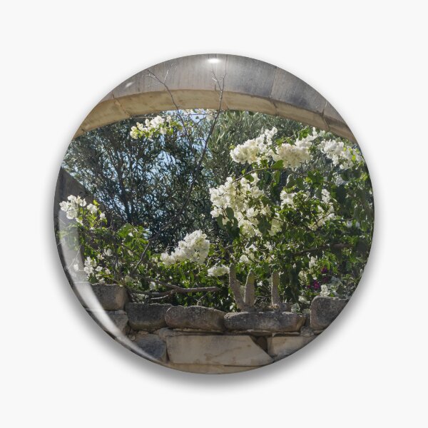 Item preview, Stone Arch Window With White Bougainvillea Blossoms Over Sunlit Mediterranean Ruin Wall designed and sold by Nmallia.