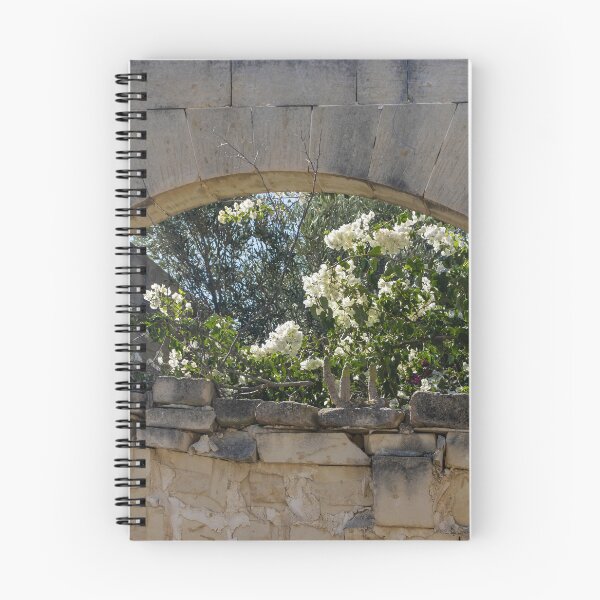 Item preview, Stone Arch Window With White Bougainvillea Blossoms Over Sunlit Mediterranean Ruin Wall designed and sold by Nmallia.