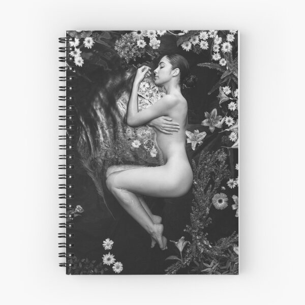 Item preview, Return to innocence female sleeping beauty amid water lilies and flower blossoms black and white photographic art print designed and sold by Astrid Arkhangelsky.