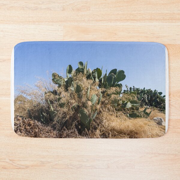 Item preview, Prickly Pear Cactus Cluster On Stone Wall At Golden Sunset Over Rural Mediterranean Hills designed and sold by Nmallia.