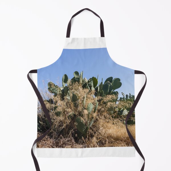 Item preview, Prickly Pear Cactus Cluster On Stone Wall At Golden Sunset Over Rural Mediterranean Hills designed and sold by Nmallia.