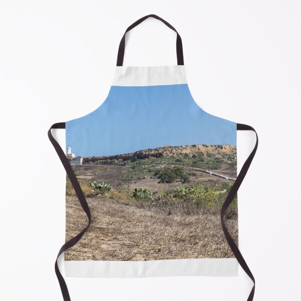 Item preview, White Lighthouse on Arid Coastal Hill Overlooking Dry Landscape and Blue Sky designed and sold by Nmallia.
