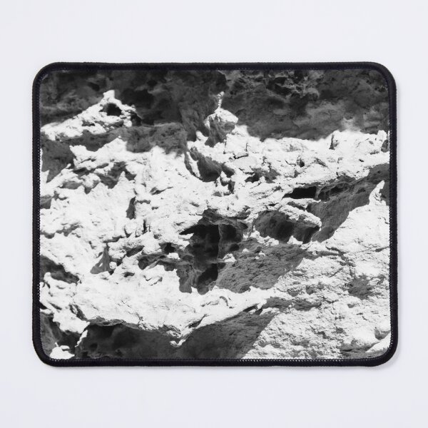 Item preview, High Contrast Textured Rock Wall With Erosion Patterns Black And White Rough Stone Surface designed and sold by Nmallia.