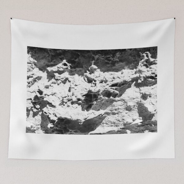 Item preview, High Contrast Textured Rock Wall With Erosion Patterns Black And White Rough Stone Surface designed and sold by Nmallia.