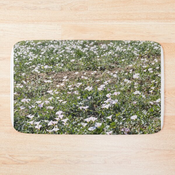 Item preview, Field Of Pale Pink Wildflowers Blanketing A Sunny Spring Meadow With Green Ground cover designed and sold by Nmallia.