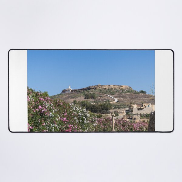 Item preview, White Lighthouse on Rocky Hill Overlooking Village and Pink Oleander Flowers Under Clear Blue Sky designed and sold by Nmallia.