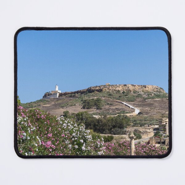 Item preview, White Lighthouse on Rocky Hill Overlooking Village and Pink Oleander Flowers Under Clear Blue Sky designed and sold by Nmallia.