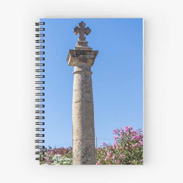 Item preview, Stone Cross on Historic Column Against Clear Blue Sky, Religious Monument Detail designed and sold by Nmallia.