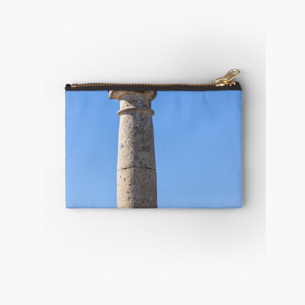 Item preview, Stone Cross on Historic Column Against Clear Blue Sky, Religious Monument Detail designed and sold by Nmallia.