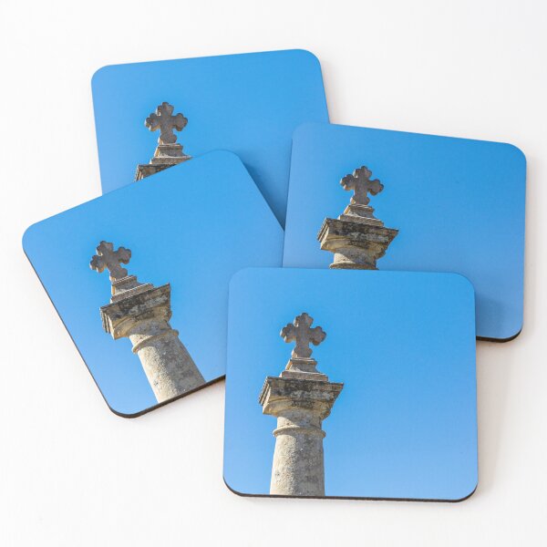 Item preview, Stone Cross on Historic Column Against Clear Blue Sky, Religious Monument Detail designed and sold by Nmallia.