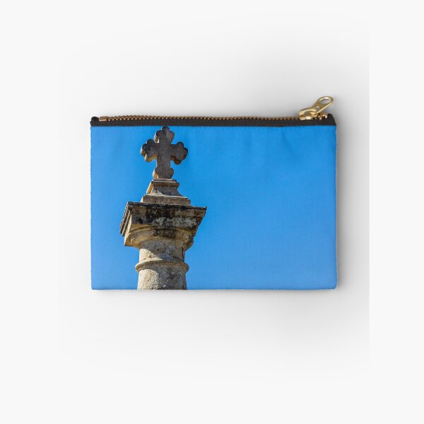 Item preview, Stone Cross on Historic Column Against Clear Blue Sky, Religious Monument Detail designed and sold by Nmallia.