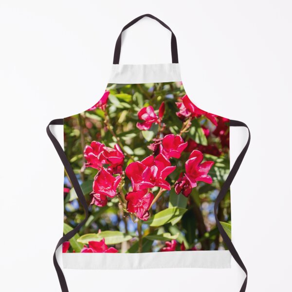 Item preview, Bright Red Oleander Flowers In Sunlit Garden With Green Leaves And Summer Bloom designed and sold by Nmallia.