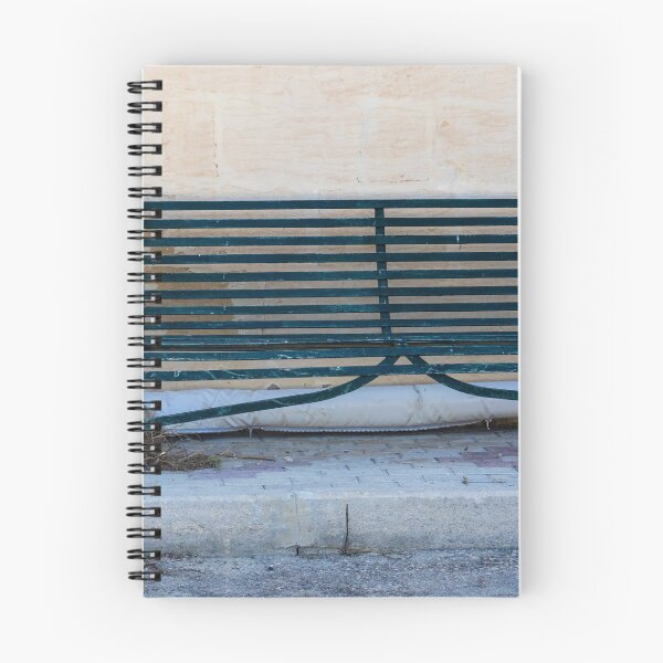 Item preview, Weathered Green Bench Against Aged Wall On Quiet Urban Sidewalk designed and sold by Nmallia.