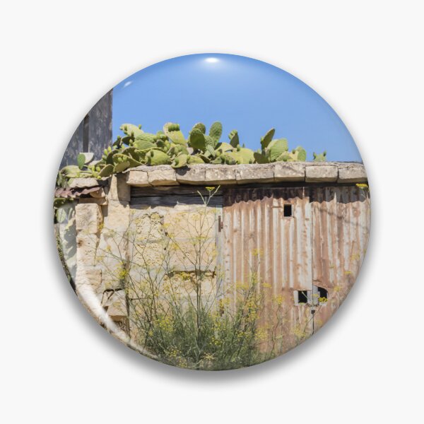 Item preview, Rusty Metal Door on Abandoned Stone Shed With Prickly Pear Cactus Under Clear Blue Sky designed and sold by Nmallia.