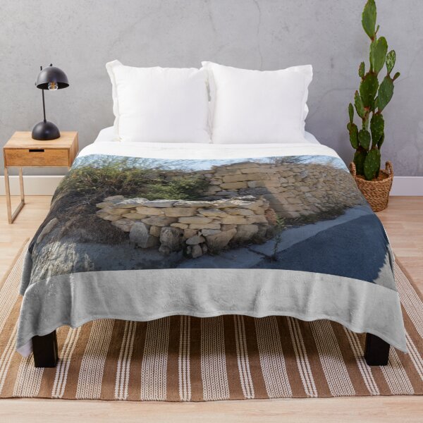 Item preview, Sunlit Dry Stone Wall Lining a Rustic Rural Country Road in Mediterranean Countryside designed and sold by Nmallia.