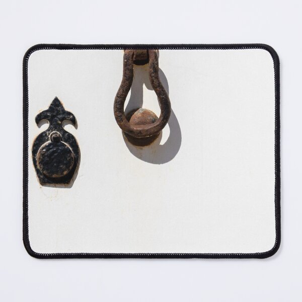 Item preview, Rusty Antique Door Knocker on White Painted Door With Strong Shadow and Minimalist Composition designed and sold by Nmallia.