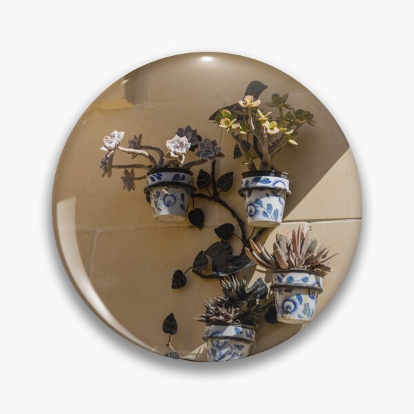 Item preview, Decorative Ceramic Flower Pots With Succulents Mounted On Sunlit Stone Wall Under Balcony Corbels designed and sold by Nmallia.
