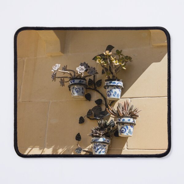 Item preview, Decorative Ceramic Flower Pots With Succulents Mounted On Sunlit Stone Wall Under Balcony Corbels designed and sold by Nmallia.