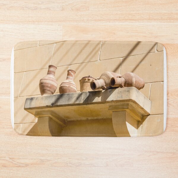 Item preview, Terracotta Clay Pots On Stone Ledge Against Sunlit Yellow Wall, Rustic Mediterranean Pottery Decor designed and sold by Nmallia.
