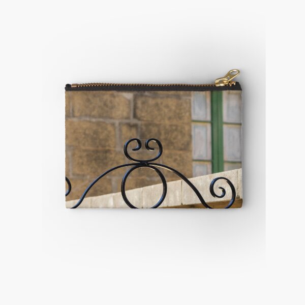 Item preview, Decorative Wrought Iron Gate With Scrollwork Against Stone Wall And Green Window designed and sold by Nmallia.