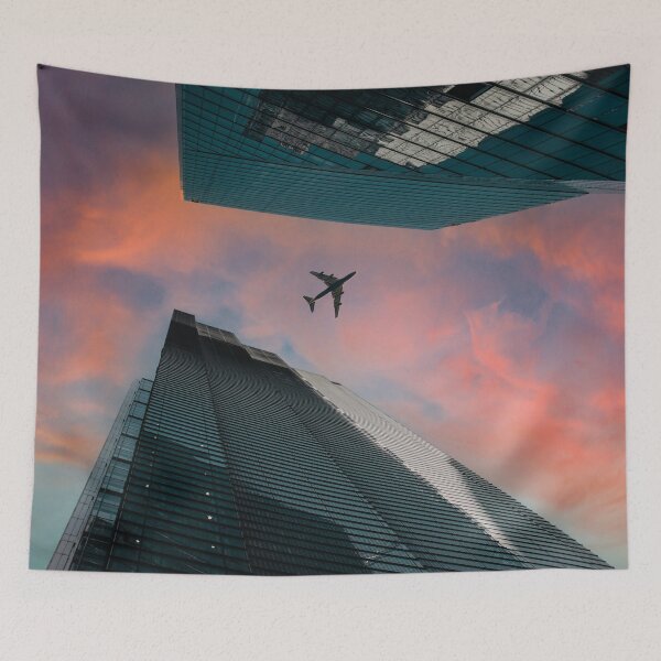 Item preview, Airplane over skyscrapers at a dramatic sunset designed and sold by Mauswohn.