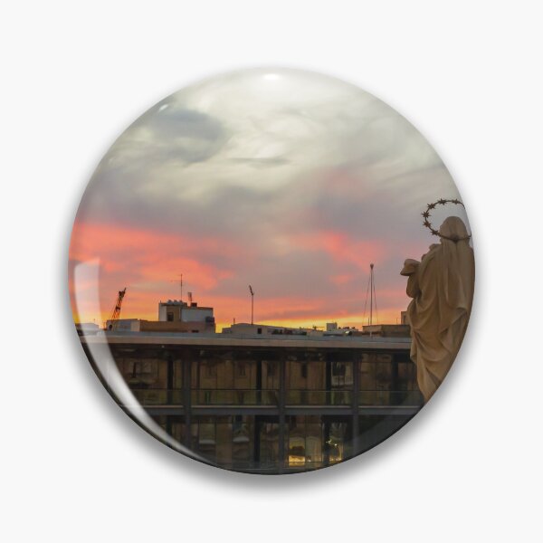 Item preview, Stone Religious Statue Overlooking Urban Harbor Skyline At Dramatic Sunset With Construction Cranes designed and sold by Nmallia.