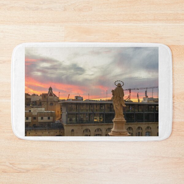 Item preview, Stone Religious Statue Overlooking Urban Harbor Skyline At Dramatic Sunset With Construction Cranes designed and sold by Nmallia.