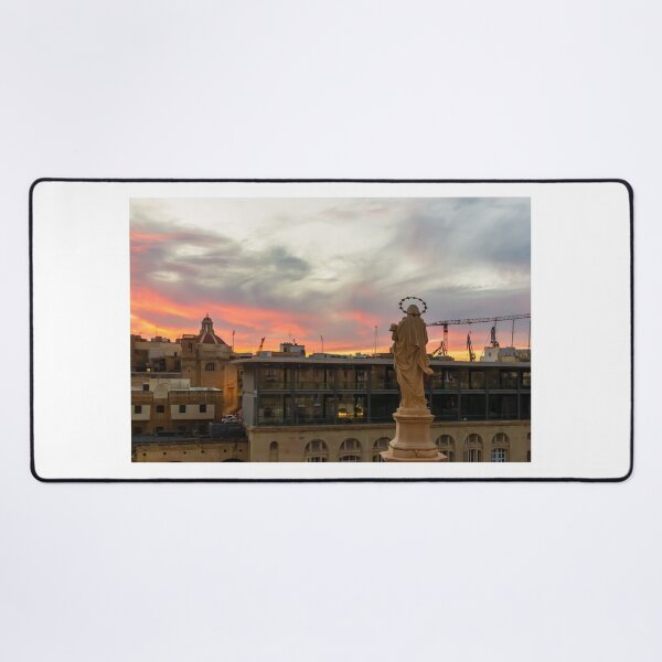 Item preview, Stone Religious Statue Overlooking Urban Harbor Skyline At Dramatic Sunset With Construction Cranes designed and sold by Nmallia.