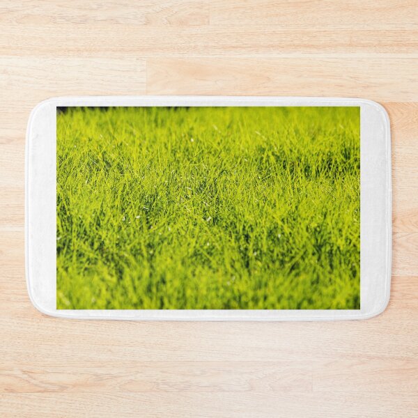 Item preview, Vibrant Green Grass Lawn Close-Up With Fresh Blades and Natural Texture in Sunlight designed and sold by Nmallia.