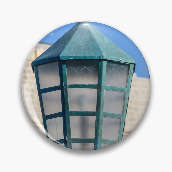 Item preview, Vintage Green Street Lamp Lantern Against Blue Sky and Stone Wall Architectural Detail designed and sold by Nmallia.